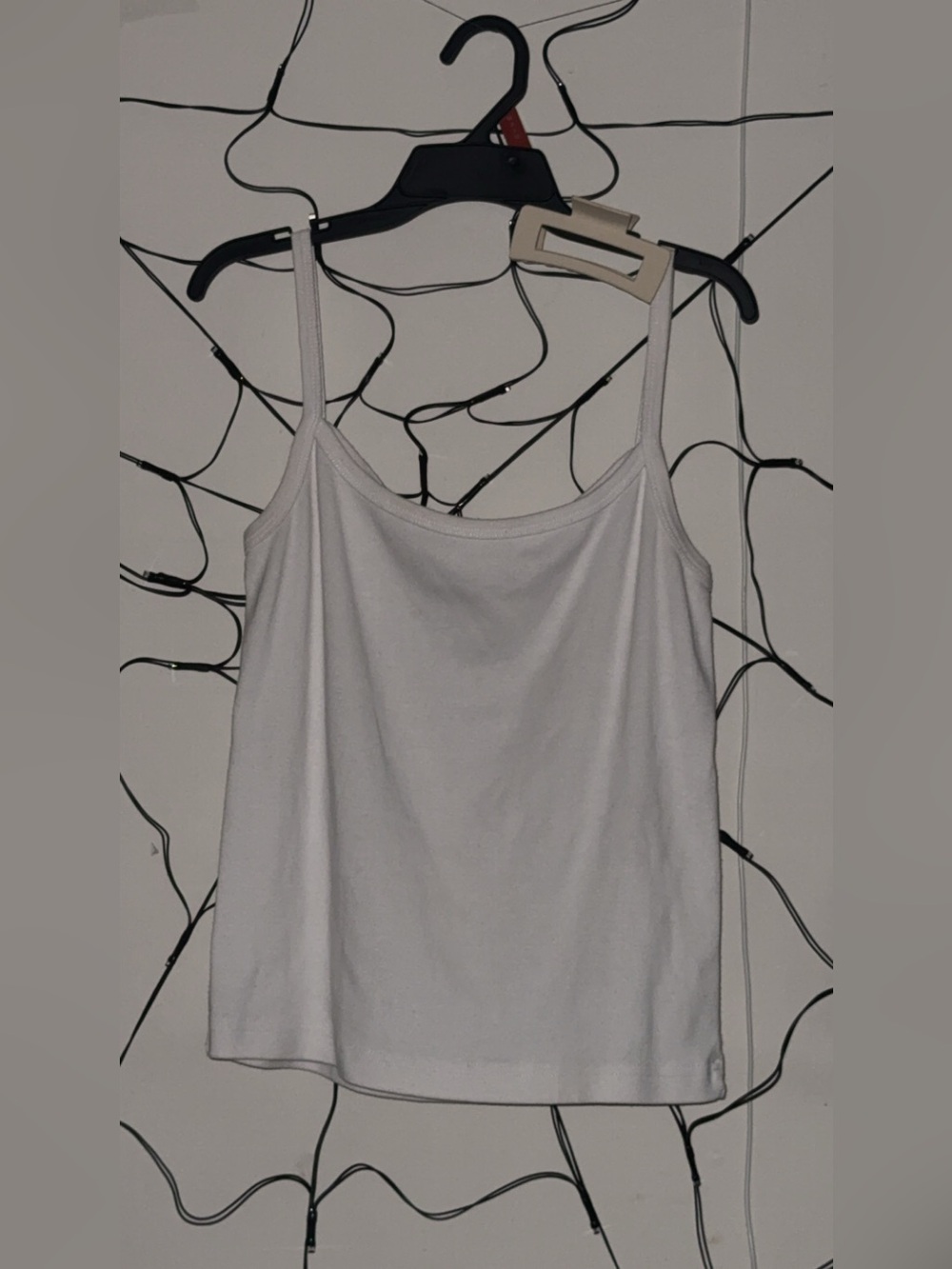 White tank top with claw clip :)